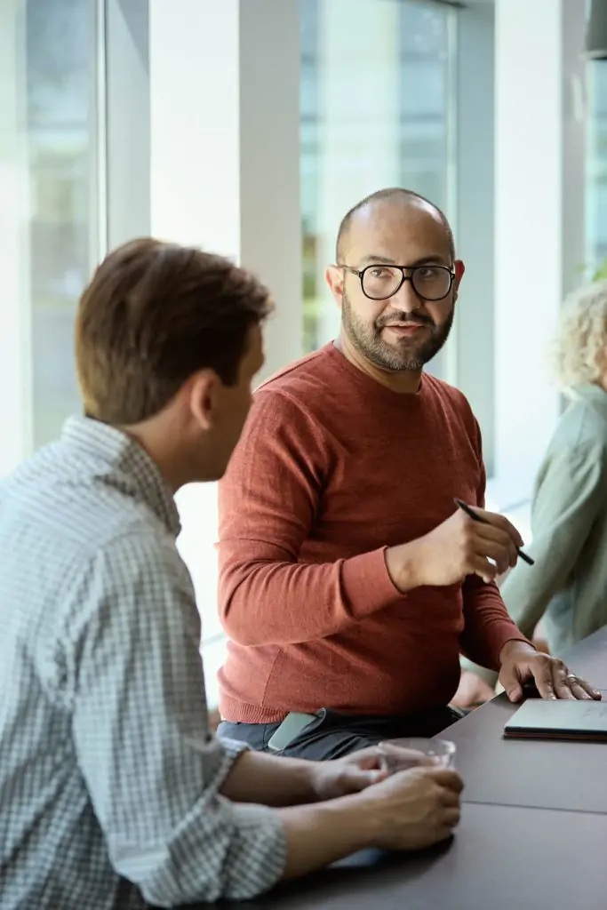 colleague explaining something one to another