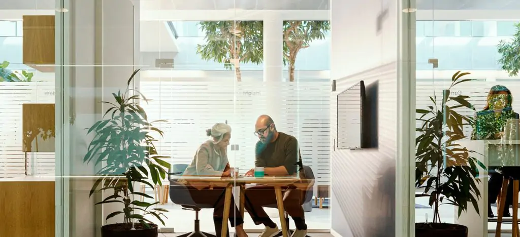two people working