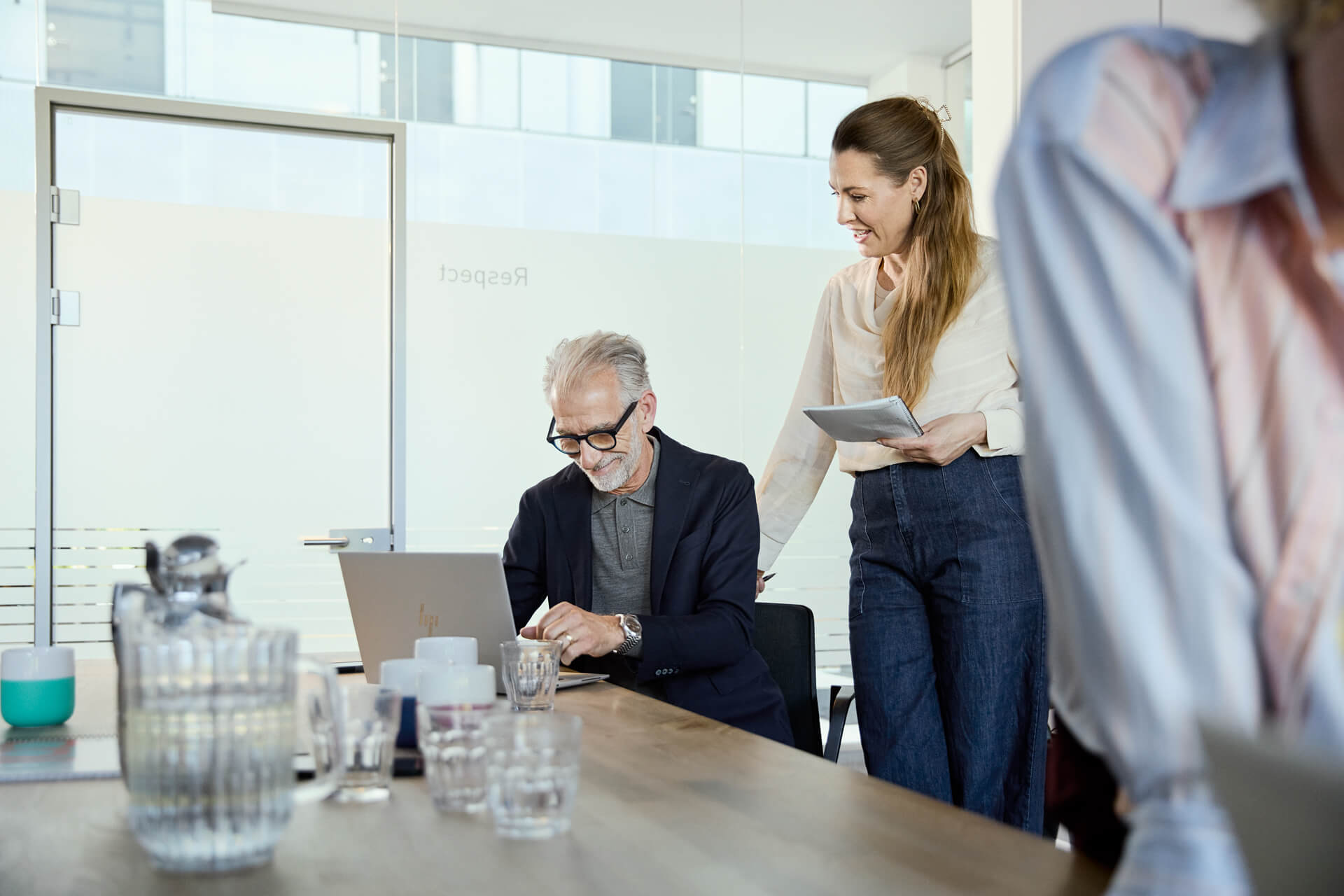men typing on a computer
