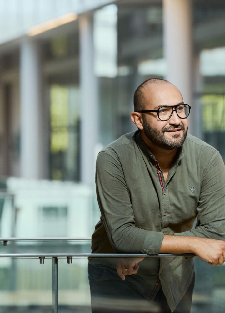 man standing on the office bridge