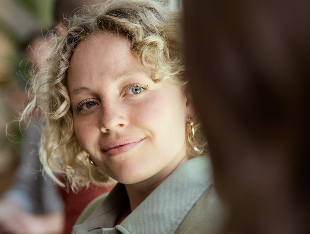 close up of a blond woman