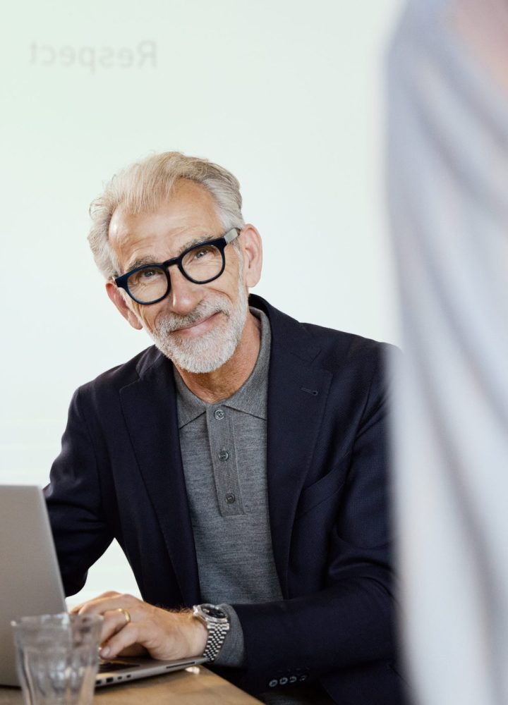 man sitting at a computer
