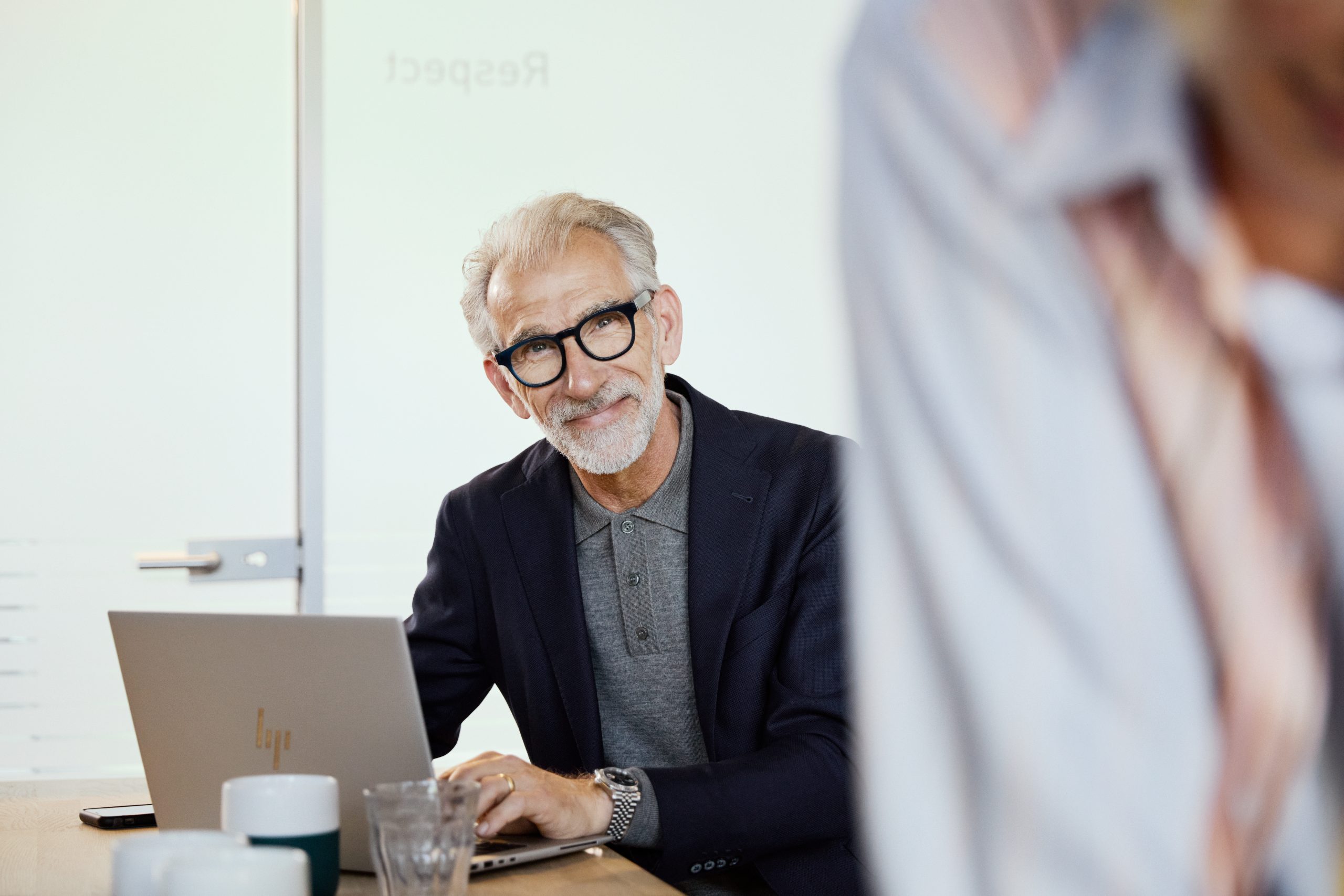 man sitting at a computer