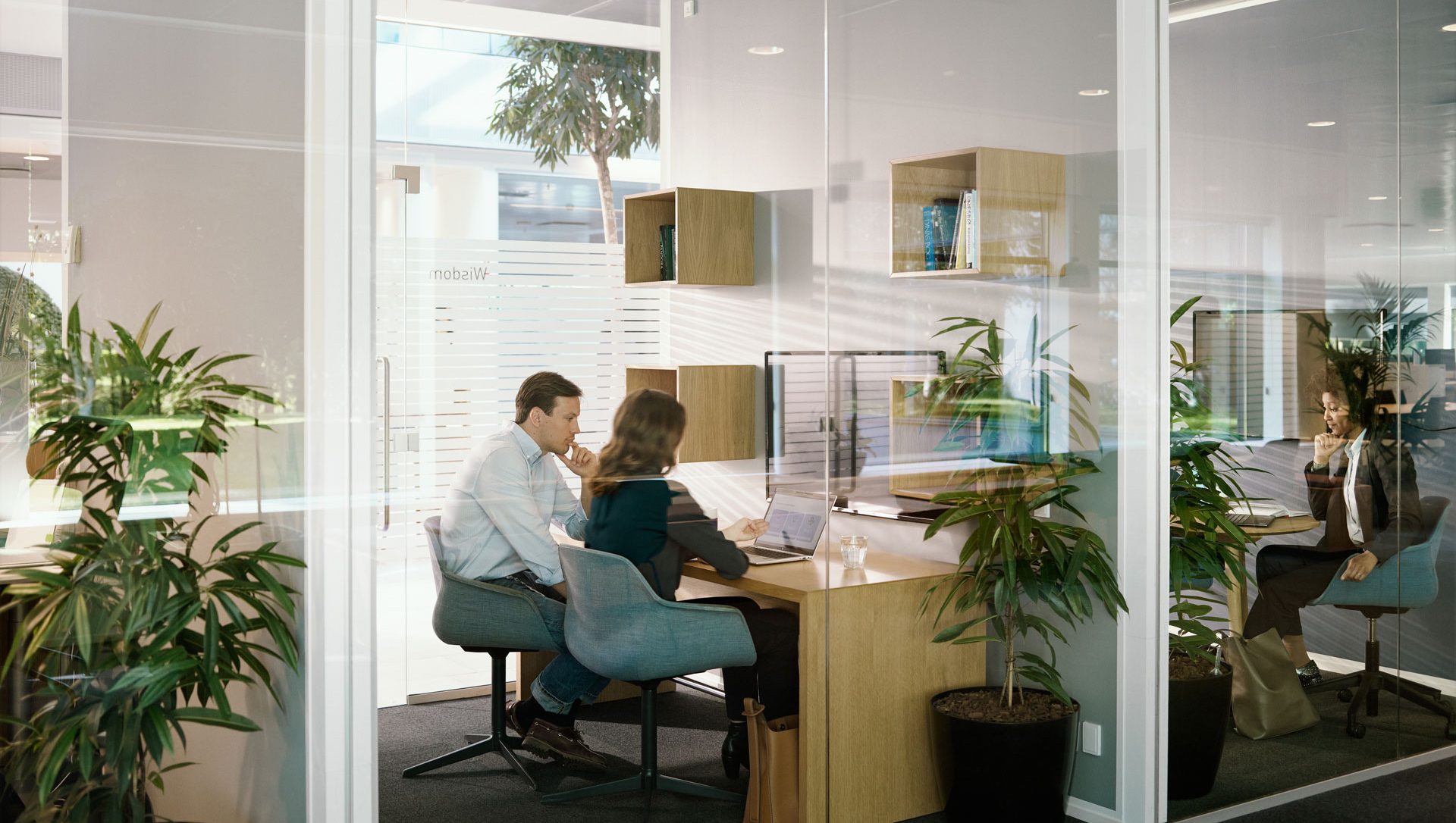 two people in a meeting room