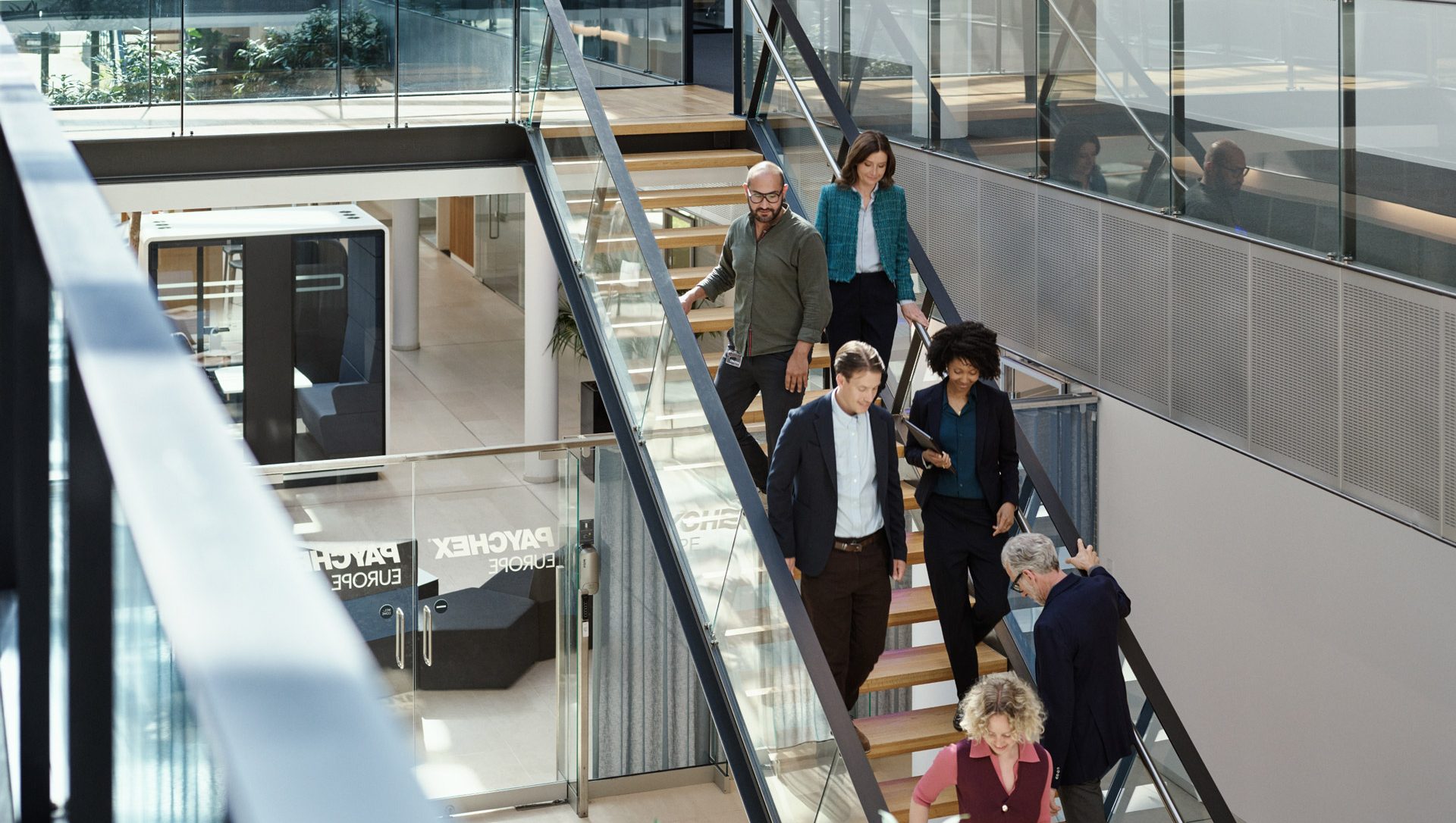 people walking down the stairs