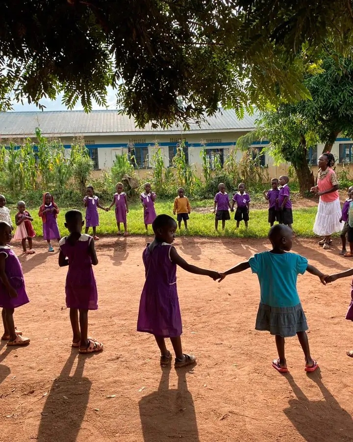 children in uganda standing in a circle